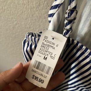 Spaghetti strap blue and white striped dress with brown buttons. missing a belt